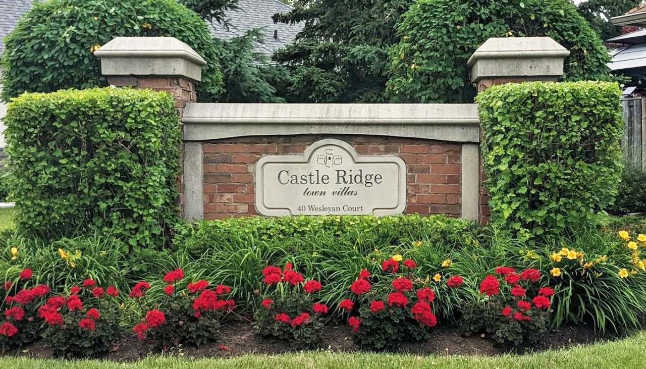 property sign with garden