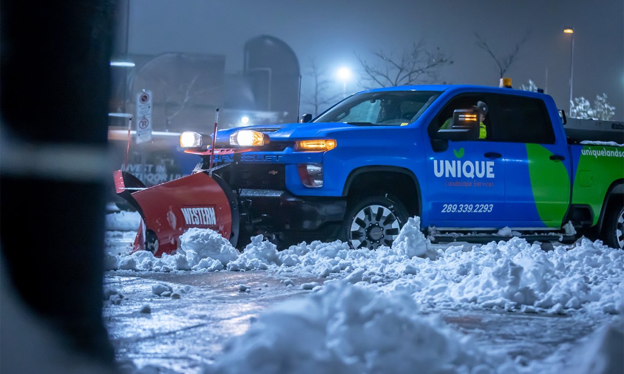 Snow removal truck pushing snow