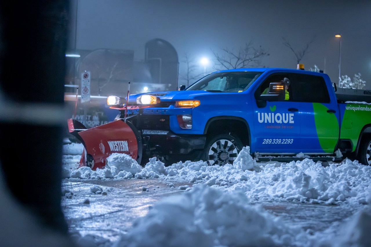 Unique's truck plowing the snow