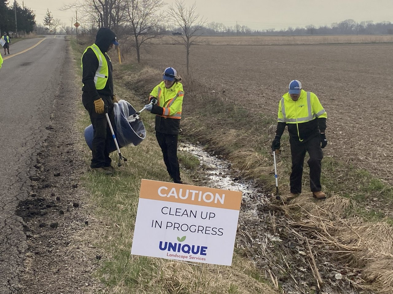Unique Landscape Services team community cleanup Jerseyville